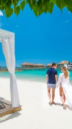 Couple on Beach Cabana Caribbean